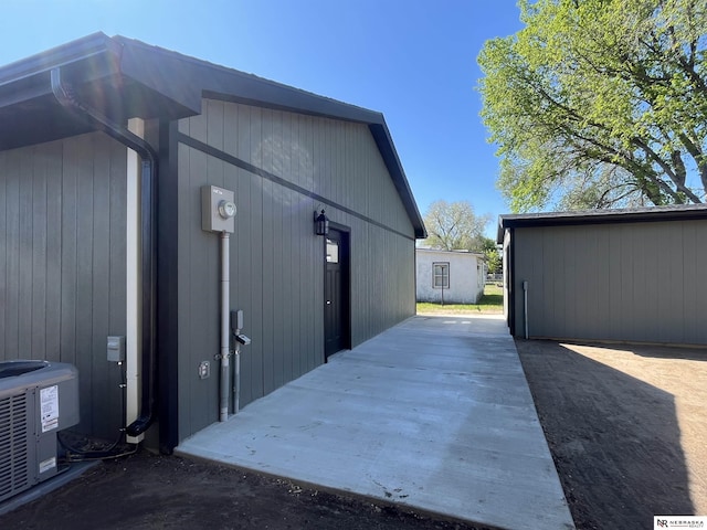 231 N Government St, Valentine, NE 69201 - view of property exterior featuring central air condition unit and a patio