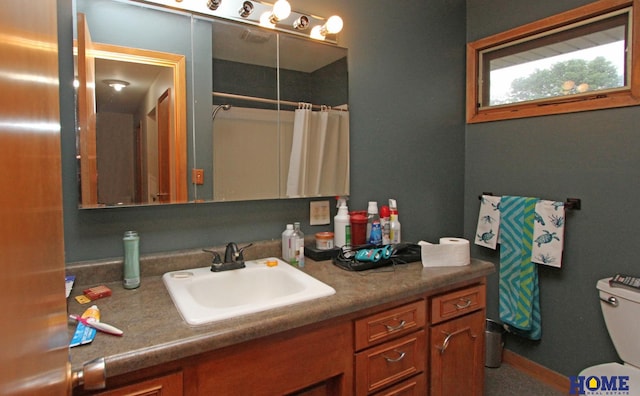6810 S St S, Lincoln, NE 68506 - full bath featuring vanity, toilet, and curtained shower