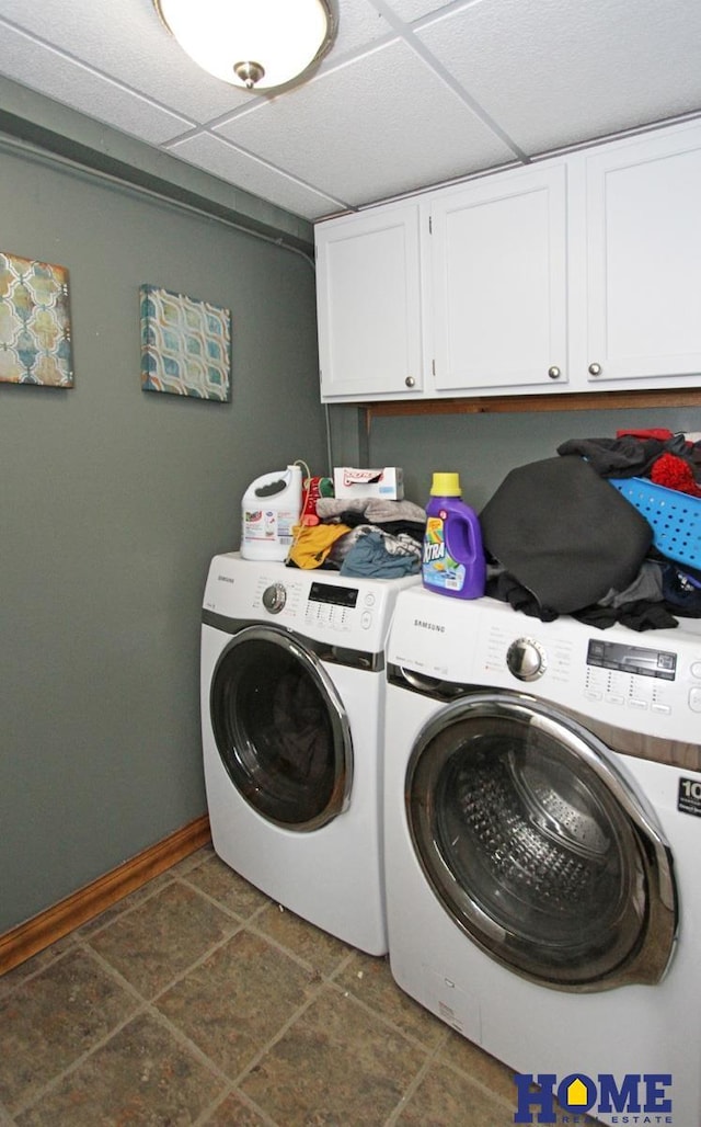 6810 S St S, Lincoln, NE 68506 - laundry area with cabinet space, washing machine and dryer, and baseboards