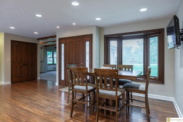 10919 N 69th St, Omaha, NE 68152 - dining area with baseboards, wood finished floors, and recessed lighting