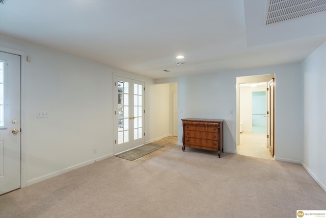 10919 N 69th St, Omaha, NE 68152 - spare room with light colored carpet, baseboards, and recessed lighting