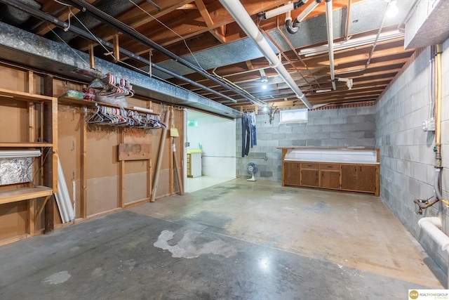 10919 N 69th St, Omaha, NE 68152 - unfinished basement featuring concrete block wall