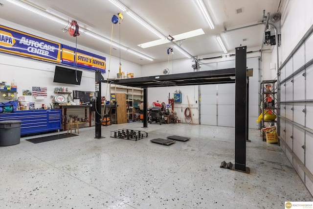 10919 N 69th St, Omaha, NE 68152 - garage with a workshop area