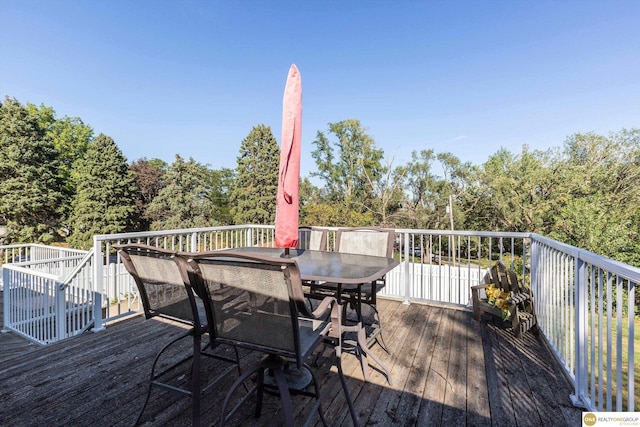 10919 N 69th St, Omaha, NE 68152 - wooden deck with outdoor dining area