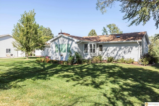 10919 N 69th St, Omaha, NE 68152 - back of property with a lawn