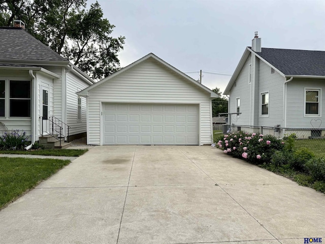 339 S Columbia Ave, Seward, NE 68434 - view of home's exterior featuring entry steps, an outdoor structure, and a garage