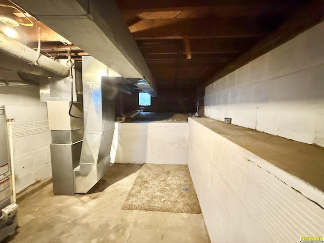 518 N 18th St, Nebraska City, NE 68410 - unfinished basement featuring concrete block wall and heating unit