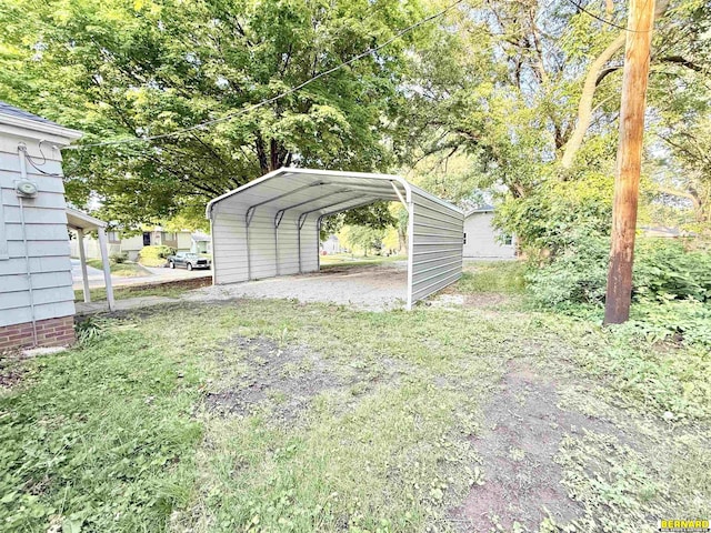 518 N 18th St, Nebraska City, NE 68410 - view of yard featuring a detached carport