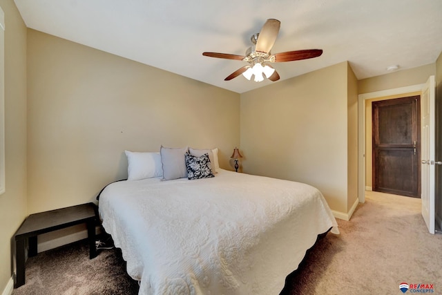 6609 Shenandoah Ct, Lincoln, NE 68510 - bedroom with light carpet, baseboards, and a ceiling fan
