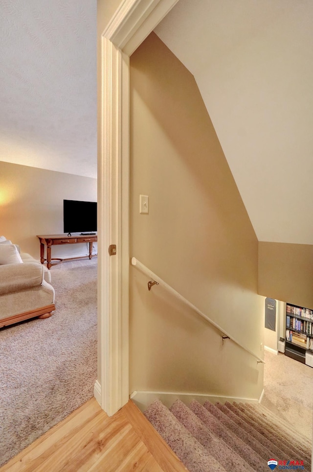 6609 Shenandoah Ct, Lincoln, NE 68510 - stairway featuring carpet and lofted ceiling