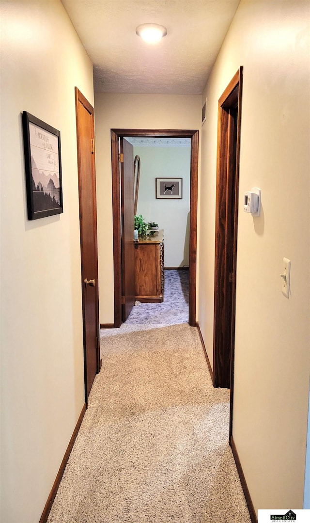5201 Danbury Ct, Lincoln, NE 68512 - corridor featuring light carpet and baseboards