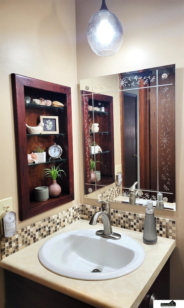 5201 Danbury Ct, Lincoln, NE 68512 - bathroom featuring backsplash and vanity