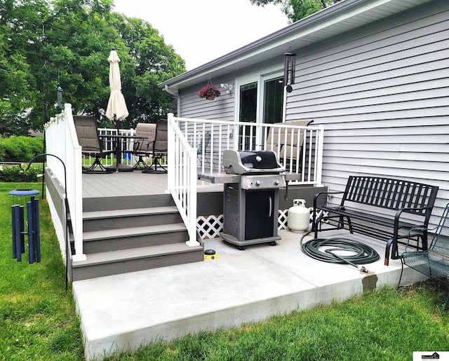 5201 Danbury Ct, Lincoln, NE 68512 - wooden terrace with a grill, outdoor dining area, and a patio area