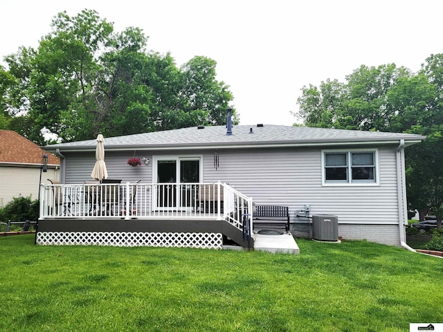 5201 Danbury Ct, Lincoln, NE 68512 - rear view of house with a deck, a yard, and central AC