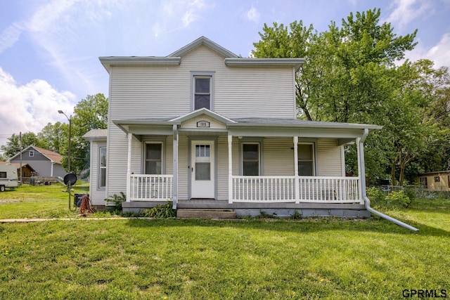 165 Monroe St, Bennet, NE 68317 - view of front of house with covered porch