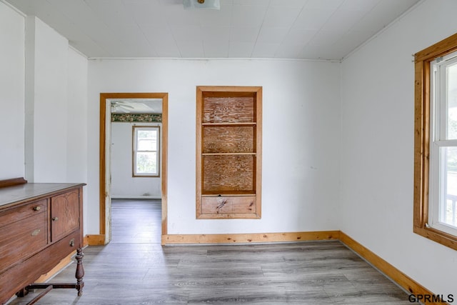 165 Monroe St, Bennet, NE 68317 - spare room featuring wood finished floors and baseboards
