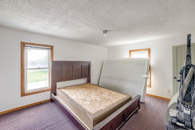165 Monroe St, Bennet, NE 68317 - carpeted bedroom featuring baseboards