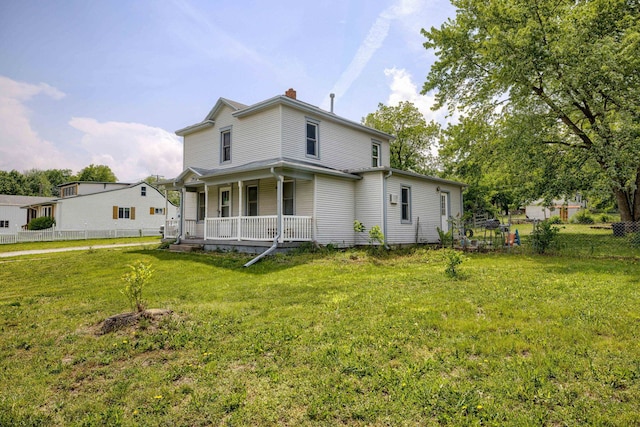 165 Monroe St, Bennet, NE 68317 - view of front facade with a porch and a chimney