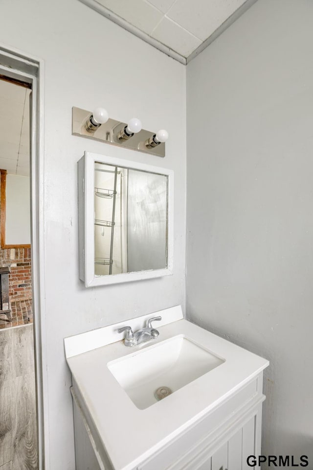 165 Monroe St, Bennet, NE 68317 - bathroom featuring vanity and a drop ceiling