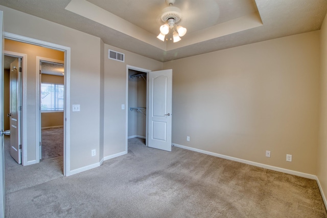 5306 S 195th St, Omaha, NE 68135 - unfurnished bedroom with carpet, a tray ceiling, and baseboards