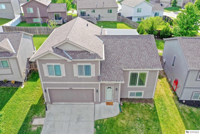 5306 S 195th St, Omaha, NE 68135 - view of front of home with a residential view, a shingled roof, a garage, and concrete driveway