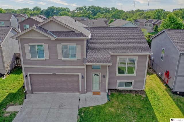 5306 S 195th St, Omaha, NE 68135 - view of front of house featuring a garage, driveway, a shingled roof, a front lawn, and a residential view