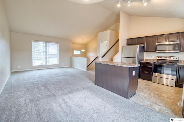 5306 S 195th St, Omaha, NE 68135 - kitchen featuring appliances with stainless steel finishes, dark brown cabinetry, track lighting, baseboards, and high vaulted ceiling