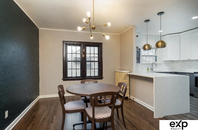 131 S 39th St Unit 6, Omaha, NE 68131 - dining room with ornamental molding, dark wood finished floors, baseboards, a chandelier, and a textured wall