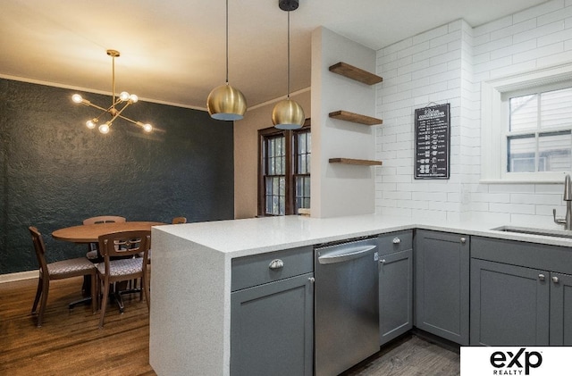 131 S 39th St Unit 6, Omaha, NE 68131 - kitchen with stainless steel dishwasher, gray cabinets, a sink, dark wood-type flooring, and a chandelier