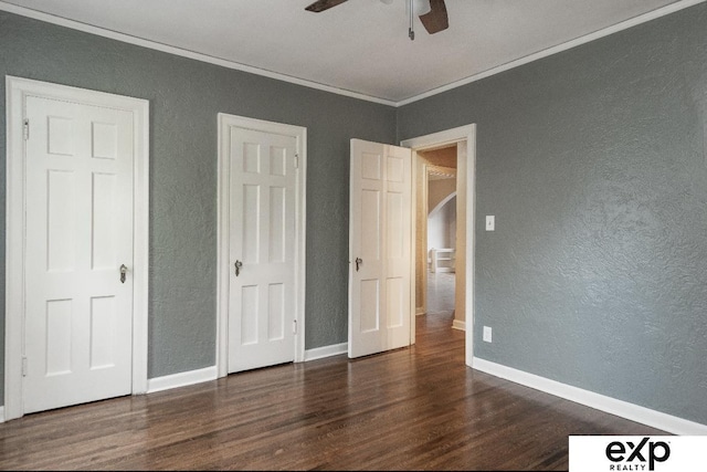 131 S 39th St Unit 6, Omaha, NE 68131 - unfurnished bedroom featuring wood finished floors, crown molding, a textured wall, baseboards, and arched walkways