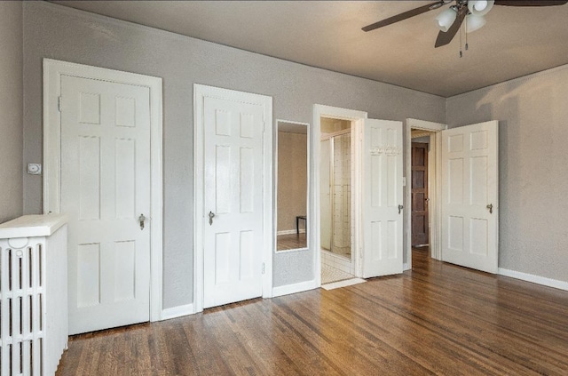 131 S 39th St Unit 6, Omaha, NE 68131 - unfurnished bedroom featuring wood finished floors, baseboards, connected bathroom, and ceiling fan