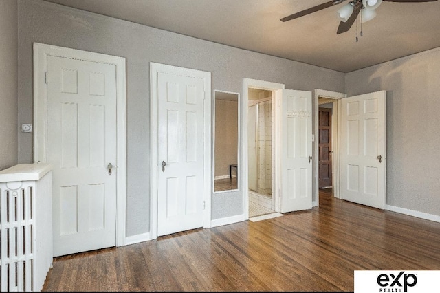 131 S 39th St Unit 6, Omaha, NE 68131 - unfurnished bedroom featuring wood finished floors, baseboards, and ensuite bath