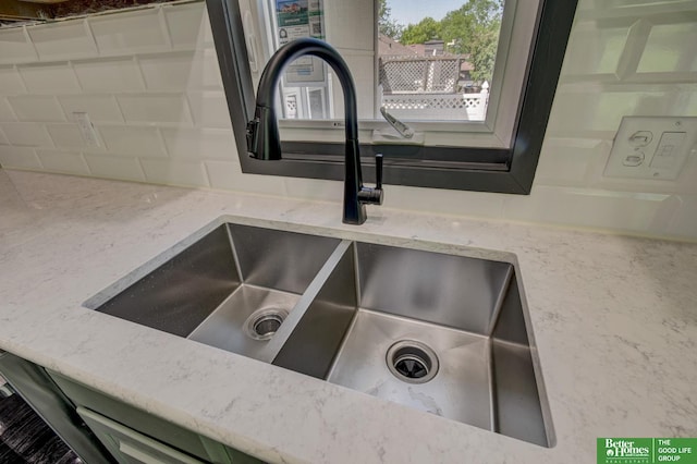 11680 Meredith Ave, Omaha, NE 68164 - kitchen view of a sink and light stone countertops