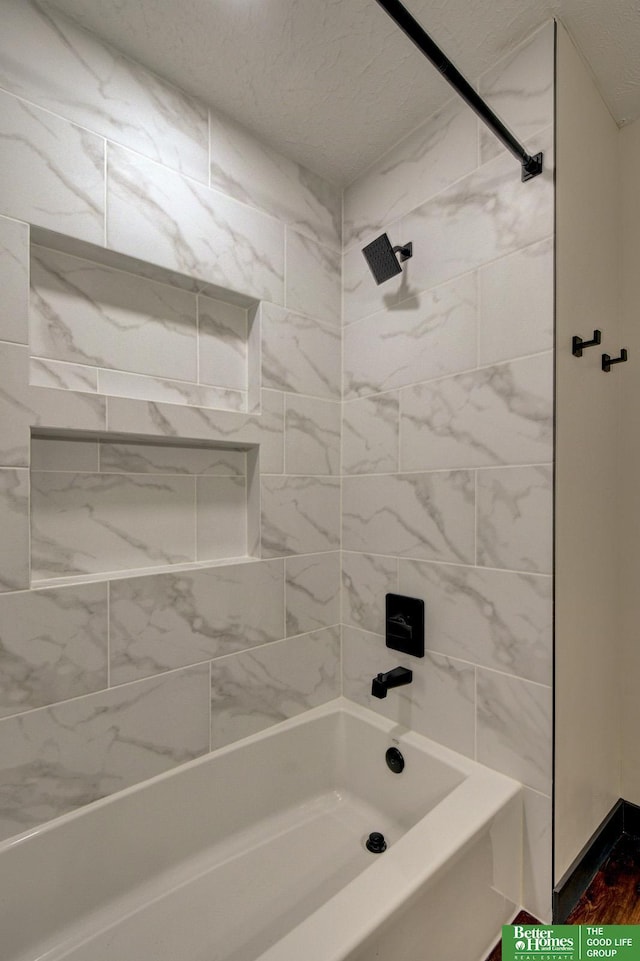 11680 Meredith Ave, Omaha, NE 68164 - bathroom featuring shower / washtub combination and a textured ceiling