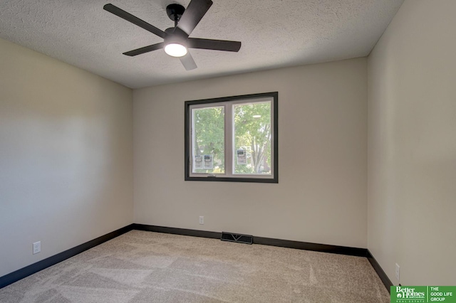 11680 Meredith Ave, Omaha, NE 68164 - carpeted spare room with baseboards, a textured ceiling, and ceiling fan