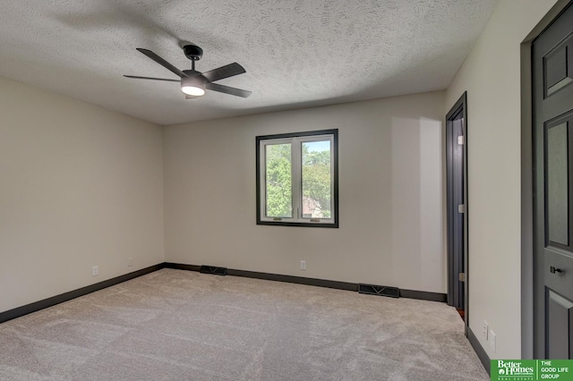 11680 Meredith Ave, Omaha, NE 68164 - unfurnished room featuring carpet, ceiling fan, baseboards, and a textured ceiling