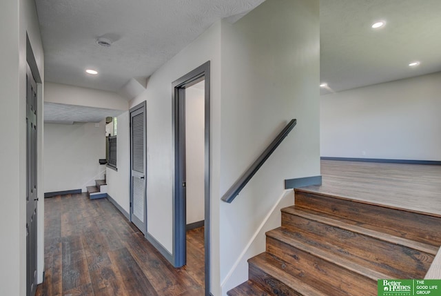 11680 Meredith Ave, Omaha, NE 68164 - stairs featuring wood finished floors, baseboards, and recessed lighting