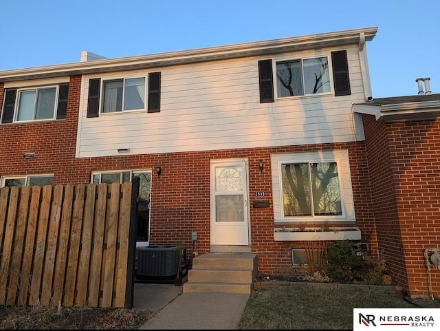 2515 3rd Street Plz, Omaha, NE 68108 - view of property with brick siding and cooling unit