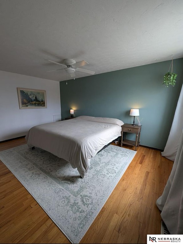 2515 3rd Street Plz, Omaha, NE 68108 - bedroom featuring wood finished floors and a ceiling fan