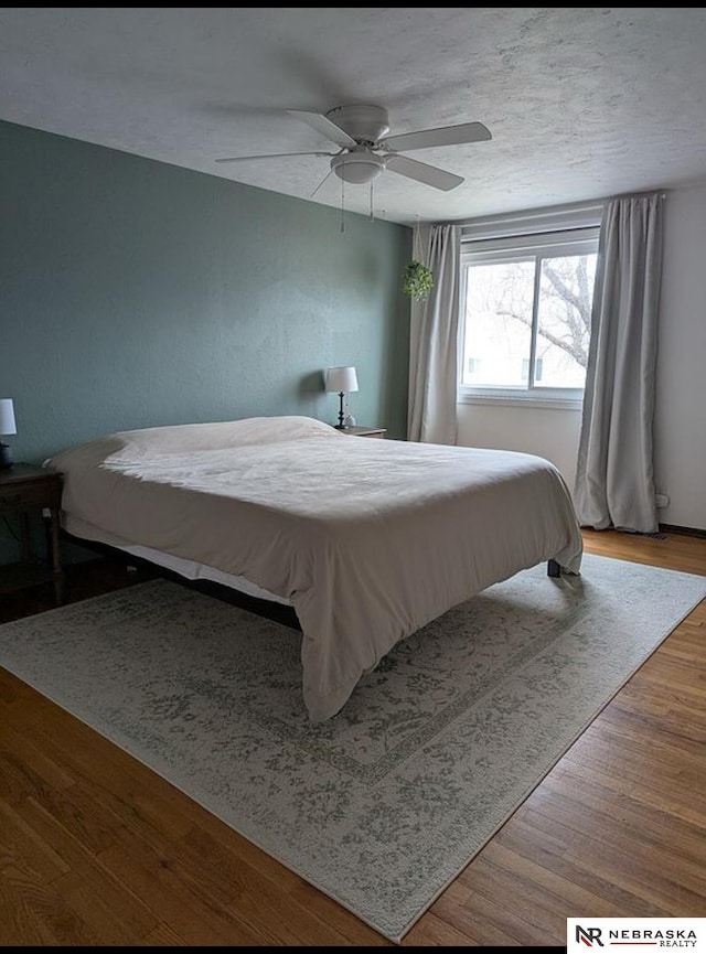 2515 3rd Street Plz, Omaha, NE 68108 - bedroom featuring wood finished floors and ceiling fan