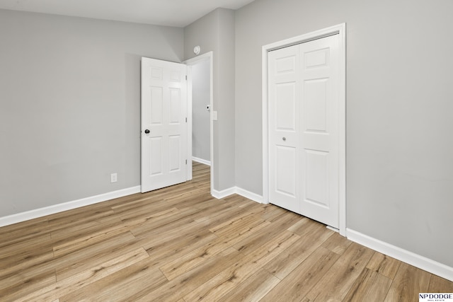4656 Redick Ave, Omaha, NE 68152 - unfurnished bedroom with light wood-style floors and baseboards