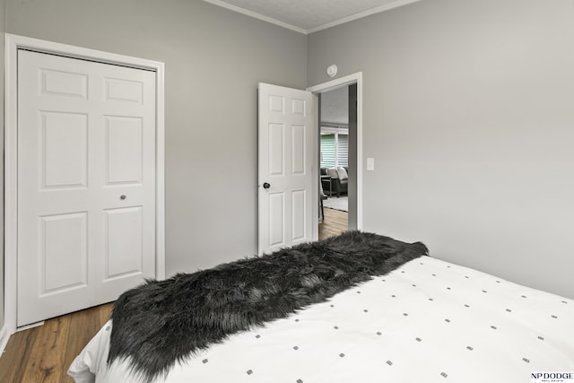 4656 Redick Ave, Omaha, NE 68152 - bedroom with crown molding and wood finished floors