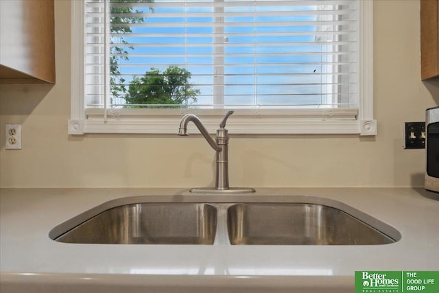 5143 S 126th Plz Unit 22, Omaha, NE 68137 - kitchen view of a sink and light countertops