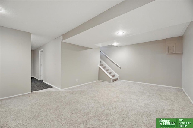 5143 S 126th Plz Unit 22, Omaha, NE 68137 - finished basement with carpet floors, baseboards, and stairway