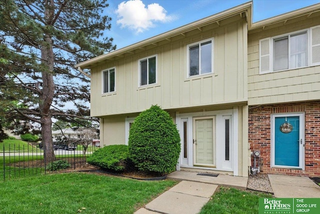 5143 S 126th Plz Unit 22, Omaha, NE 68137 - view of front of property featuring brick siding and board and batten siding