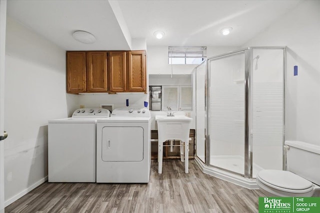 5143 S 126th Plz Unit 22, Omaha, NE 68137 - washroom featuring independent washer and dryer and light wood-style floors