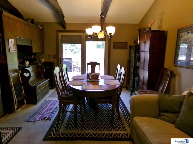 1304 S 4th Ave, Beatrice, NE 68310 - carpeted dining area with a chandelier