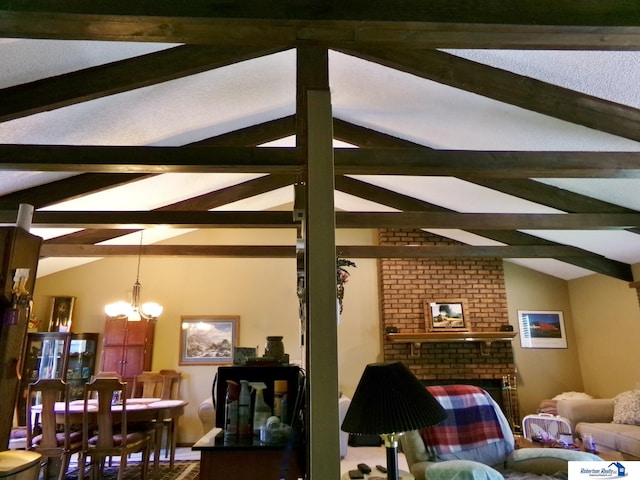 1304 S 4th Ave, Beatrice, NE 68310 - living area with a fireplace and a chandelier