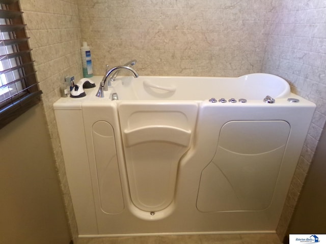 1304 S 4th Ave, Beatrice, NE 68310 - washroom featuring tile walls