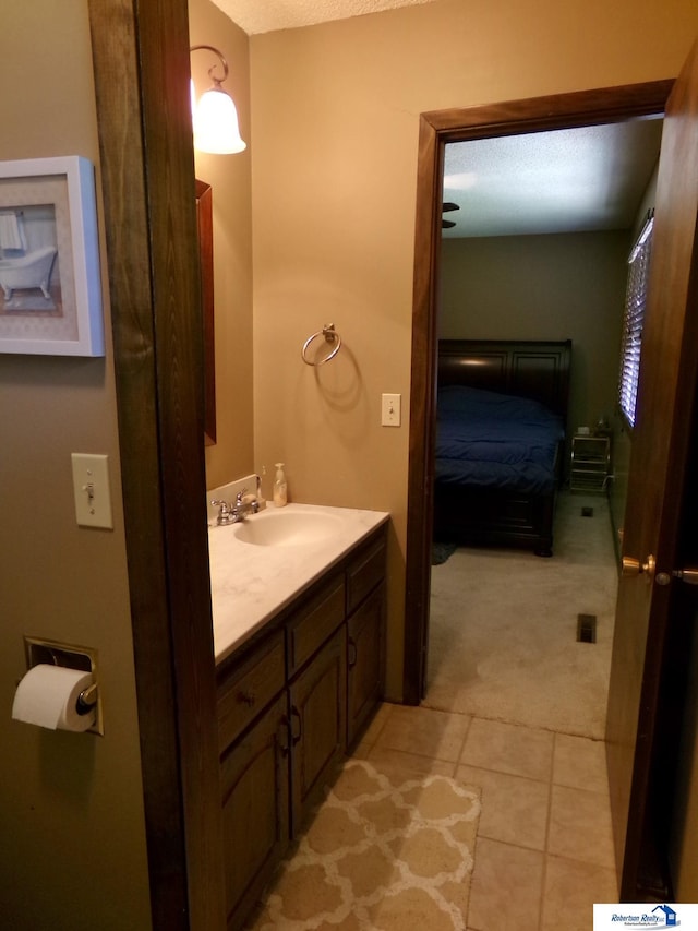 1304 S 4th Ave, Beatrice, NE 68310 - ensuite bathroom featuring vanity and tile patterned flooring